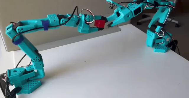 Real robot arm performing an inspection-style task